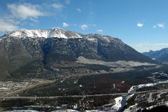 06 Canmore, Grotto Mountain From Helicopter Just After Takeoff From Canmore To Mount Assiniboine In Winter